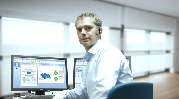 Man with headset sitting at computer