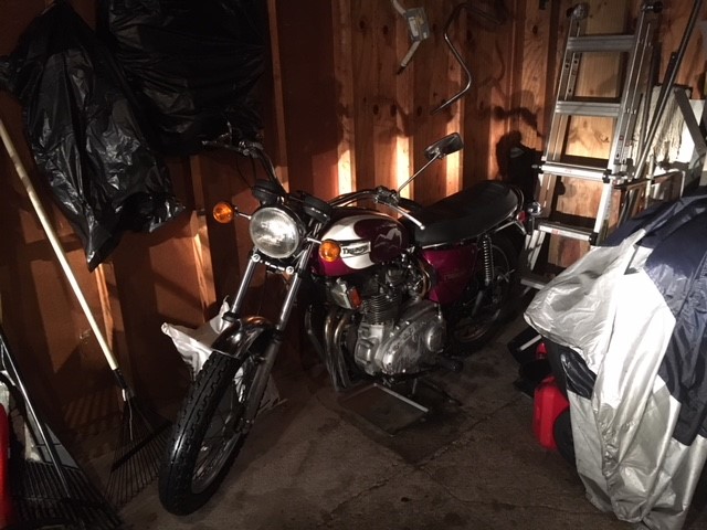 Motorcycle stored in a shed