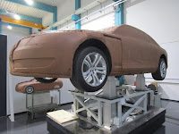 car model mounted on higher posts