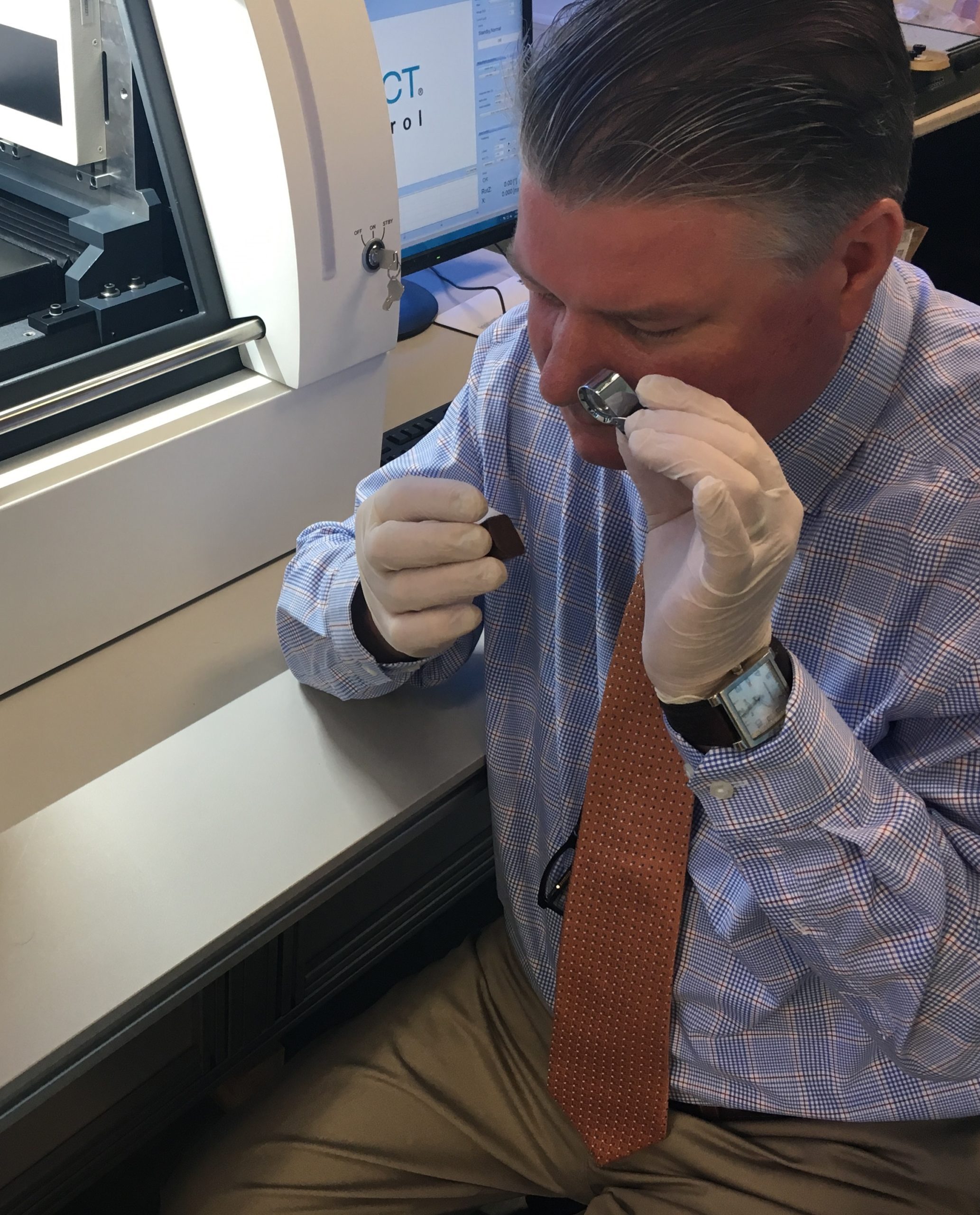 giles examining a peanut