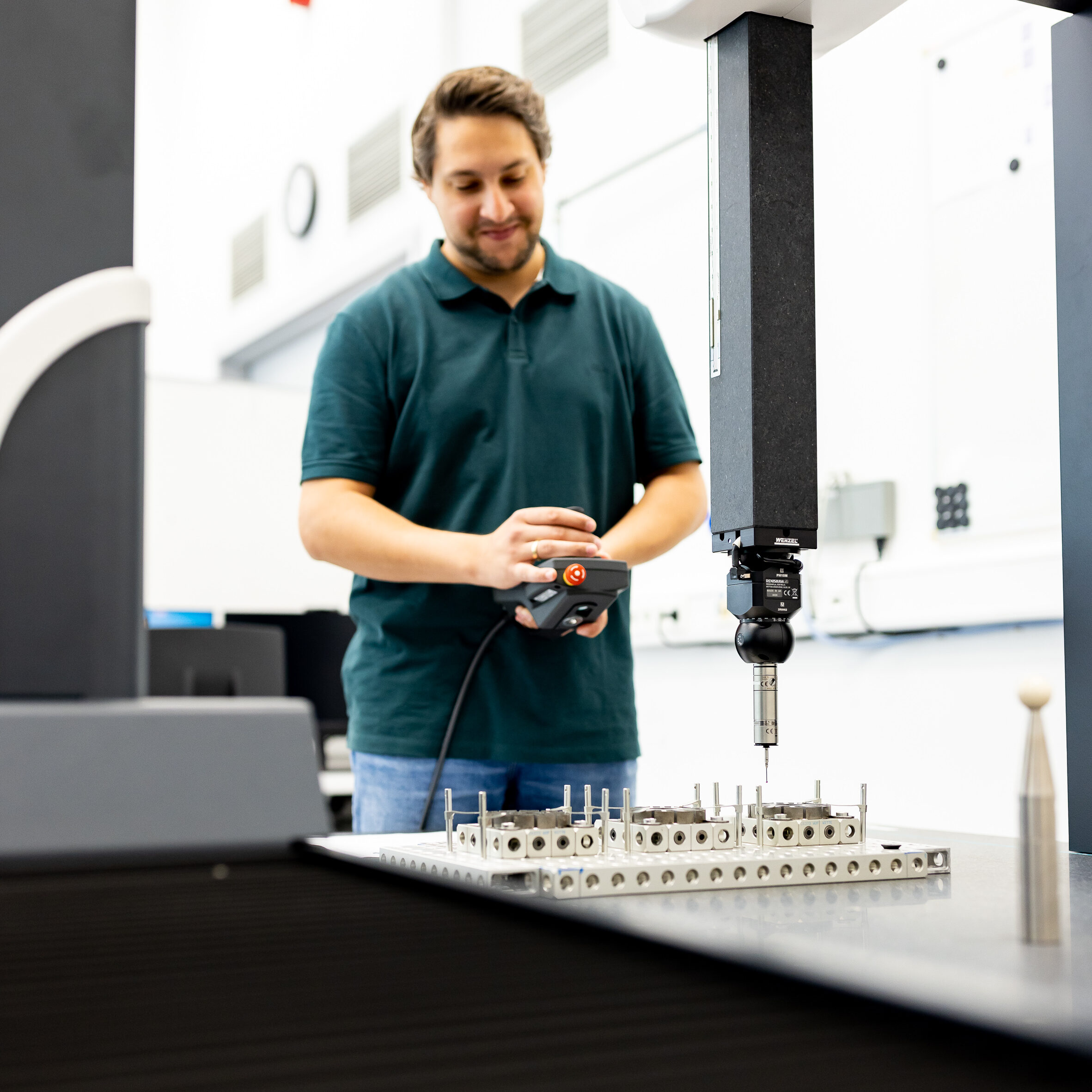 Engineer configuring a piece of metrology equipment